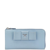 プラダ フィオッコ リボンモチーフ L字ファスナー 長財布 1ML183 ライトブルー サフィアーノレザー レディース PRADA 【中古】